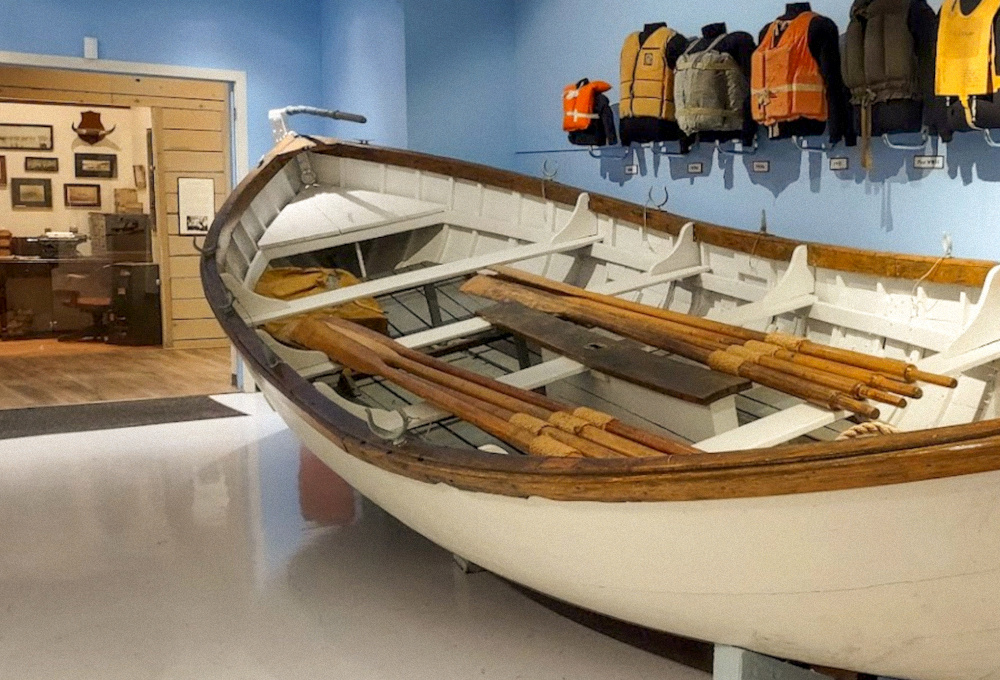 Coast Guard rowboat and lifejackets at the Columbia Pacific Heritage Museum.jpg